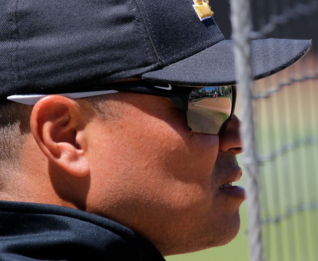 Missouri assistant coach Chris Malveaux watches a Missouri hitter at bat